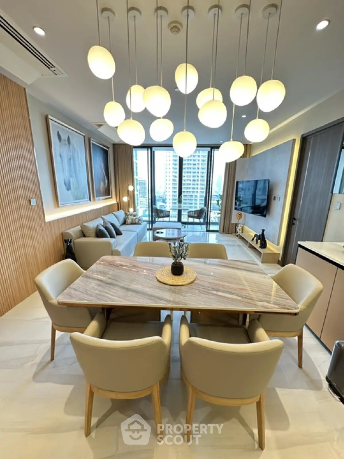 Luxurious modern living room with elegant dining area and stunning city view