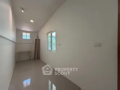 Minimalist study room with natural light and sleek flooring