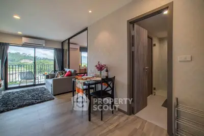Modern living room with balcony view and dining area in stylish apartment