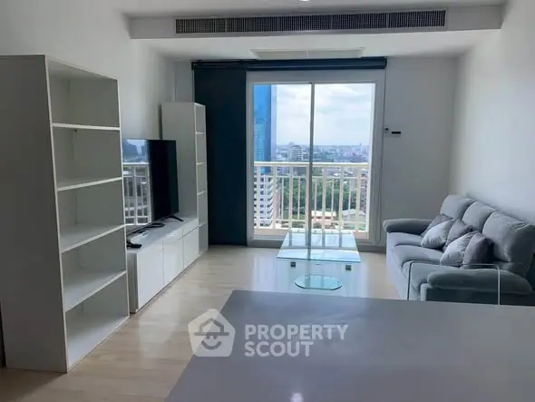 Modern living room with city view and sleek furniture