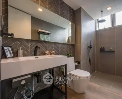 Modern bathroom with sleek design and spacious shower area
