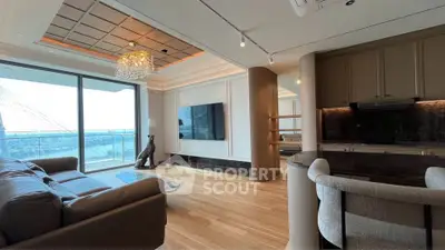 Luxurious living room with modern decor and stunning balcony view