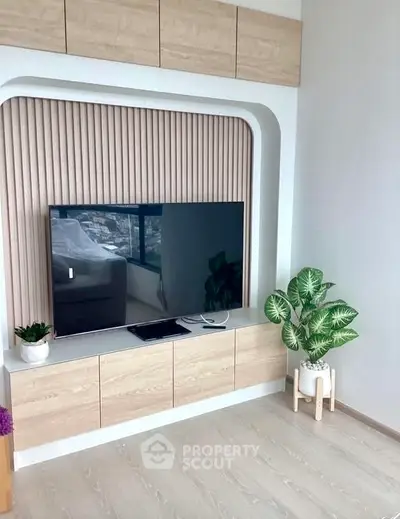 Modern living room with sleek TV unit and stylish decor