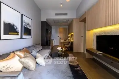 Modern living room with elegant decor and cozy seating area in a stylish apartment.