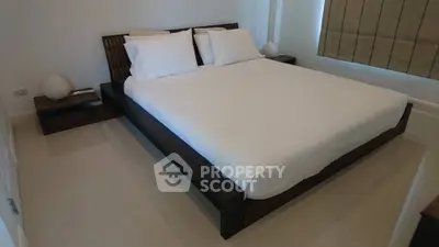 Modern bedroom with minimalist design and cozy ambiance