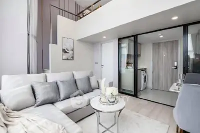 Modern duplex living room with stylish decor and open layout