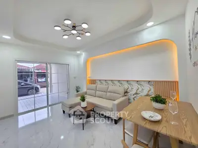 Modern living room with stylish lighting and elegant decor