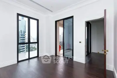 Spacious modern apartment with large windows and city view