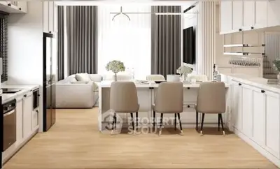 Modern open-layout kitchen and living room with elegant decor and natural light.