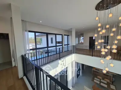 Stunning modern duplex interior with elegant lighting and spacious open layout, perfect for contemporary living.