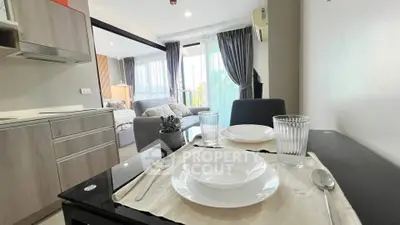 Modern open-plan living and dining area with stylish decor and natural light.