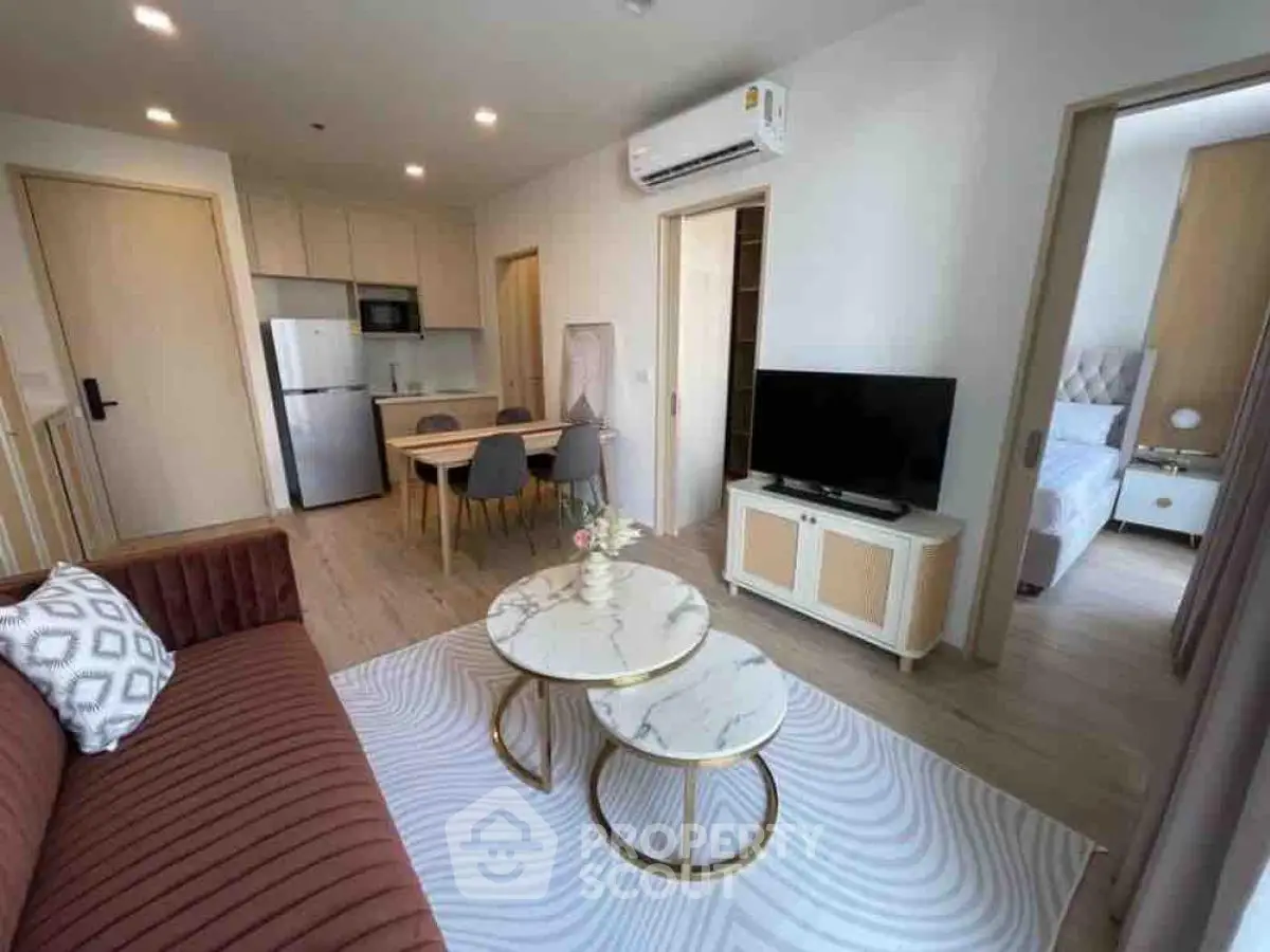 Modern living room with stylish furniture and open layout in a contemporary apartment.