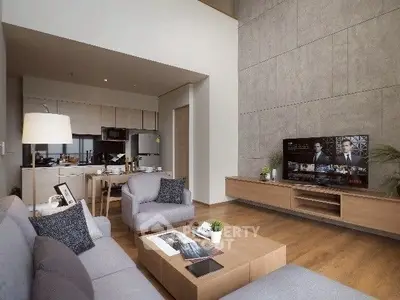 Modern living room with open kitchen and stylish decor