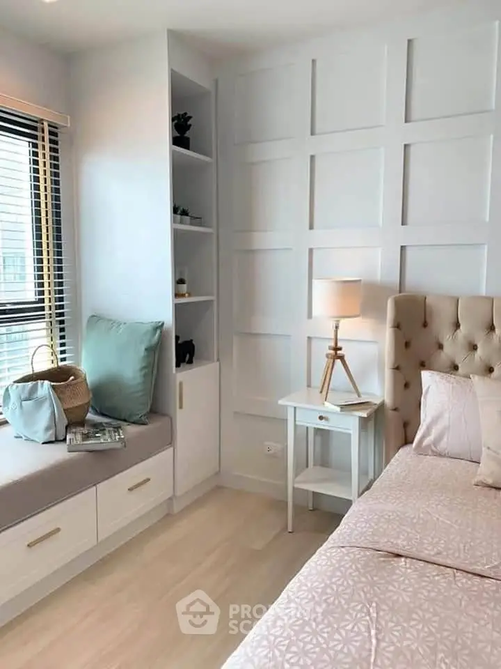 Charming bedroom with cozy window seat and elegant decor