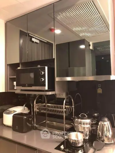 Modern kitchen with sleek appliances and stylish cabinetry