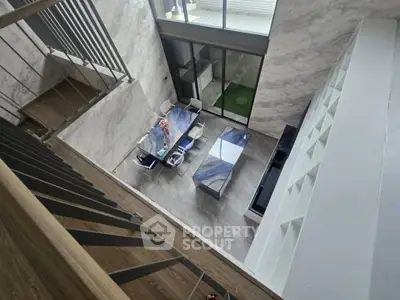 Stunning modern interior with open layout and elegant staircase, perfect for contemporary living.