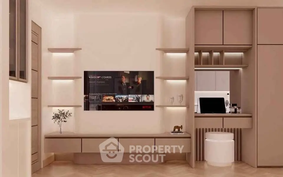 Modern living room with built-in shelves and wall-mounted TV, featuring sleek design and neutral tones.