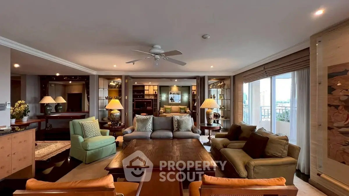 Luxurious and spacious living room with elegant decor and ample natural light.