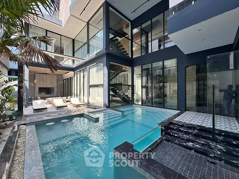 Luxurious modern villa with stunning pool and sleek architectural design, perfect for upscale living.