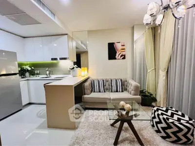 Modern open-layout living room with stylish kitchen and chic decor