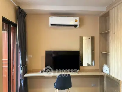 Modern study room with air conditioning and sleek wooden desk