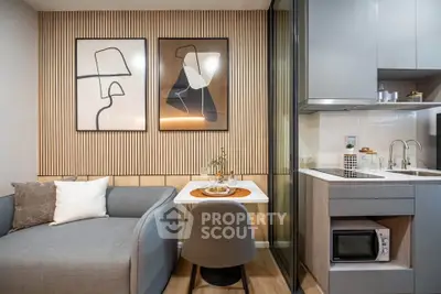 Modern compact living space with stylish decor and integrated kitchen area