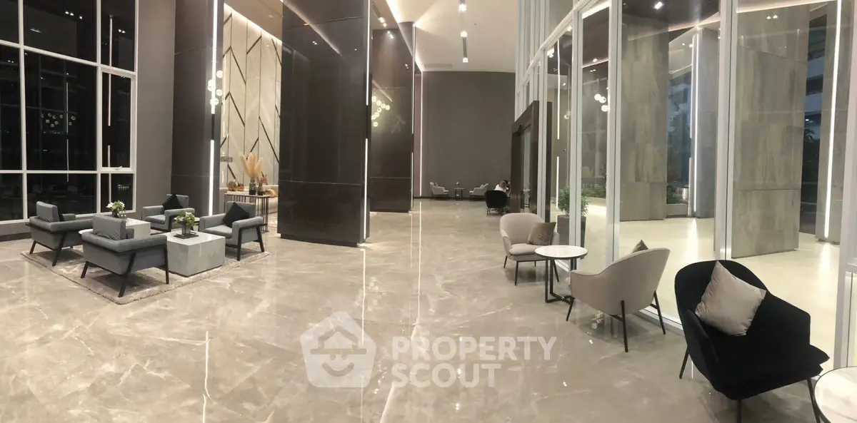 Luxurious modern lobby with elegant seating and marble flooring