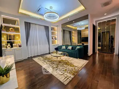 Luxurious living room with elegant decor, plush seating, and ambient lighting