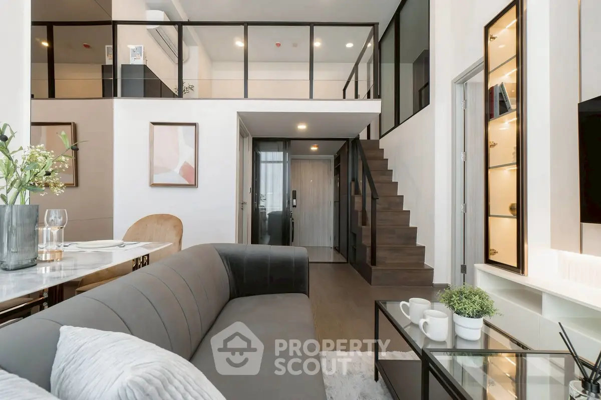 Modern loft apartment with stylish living room and mezzanine level