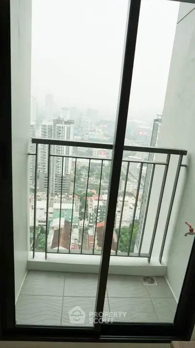 Stunning cityscape view from a high-rise balcony, perfect for urban living enthusiasts.