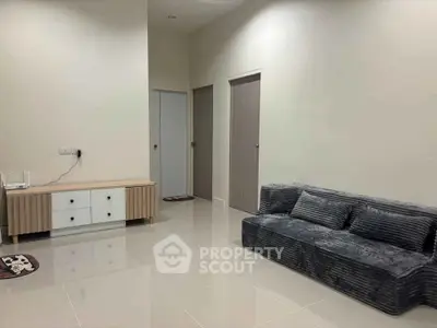 Modern living room with sleek furniture and minimalist design