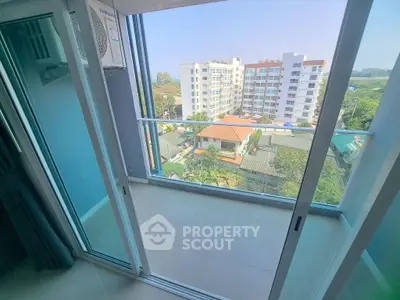 Spacious balcony with stunning city view in modern apartment