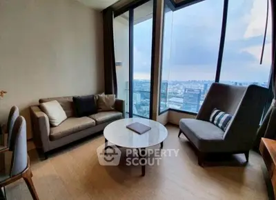 Modern living room with panoramic city view and stylish furniture
