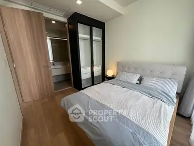 Modern bedroom with ensuite bathroom and stylish decor