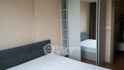 Modern bedroom with sleek design and ample storage space