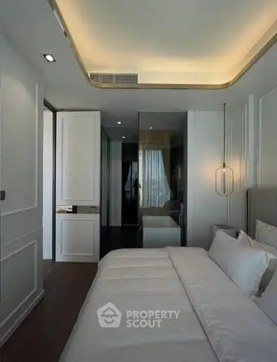 Luxurious modern bedroom with elegant lighting and sleek design