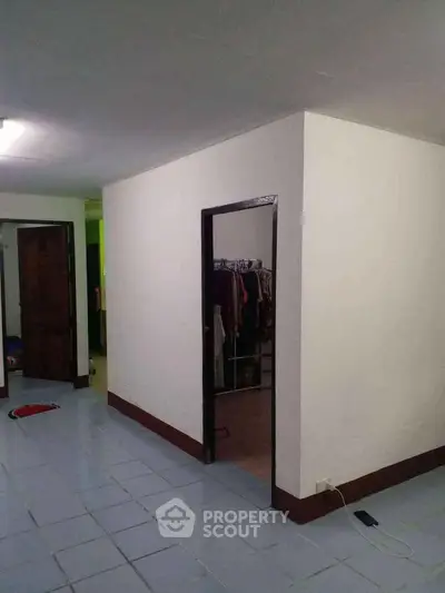 Spacious interior with tiled flooring and open layout, ideal for customization.