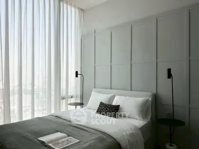 Modern bedroom with elegant design and natural light