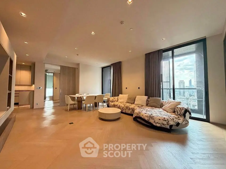 Spacious modern living room with city view and elegant furnishings