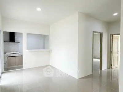 Spacious modern apartment with open layout and sleek kitchen design