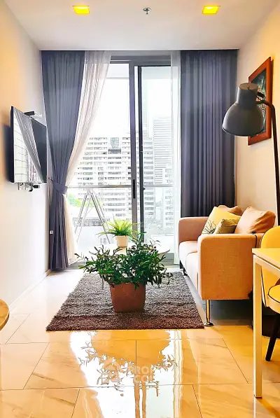 Modern living room with balcony view in high-rise apartment