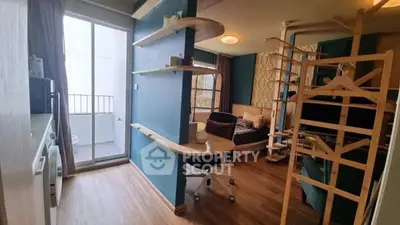 Modern studio apartment with stylish decor and balcony access