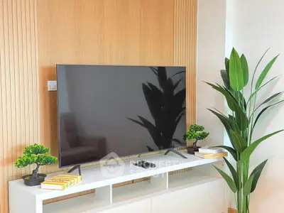 Modern living room with sleek TV setup and stylish decor