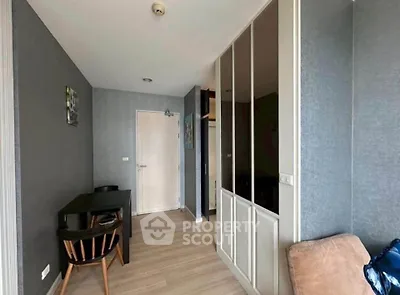 Modern living room with sleek furniture and stylish decor in a contemporary apartment.