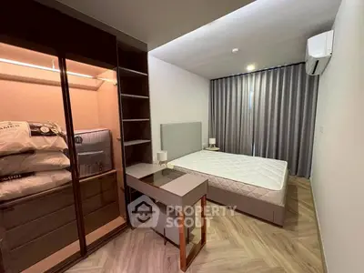 Modern bedroom with stylish furniture and ample storage space