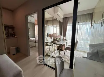 Modern apartment interior with dining area and city view