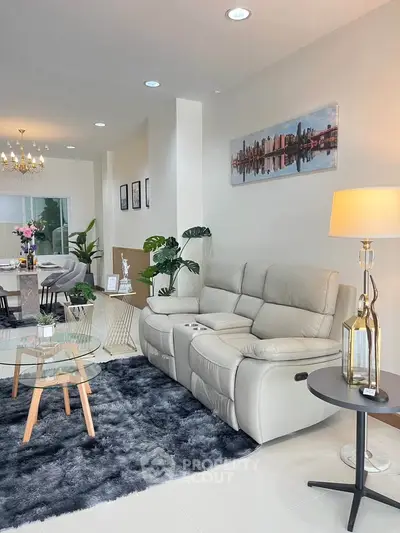 Stylish living room with modern decor and plush seating in a contemporary home.