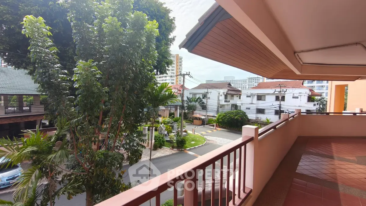 Spacious balcony with city view, perfect for relaxation and enjoying the urban landscape.