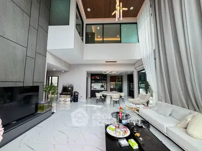 Luxurious modern living room with high ceilings and elegant decor