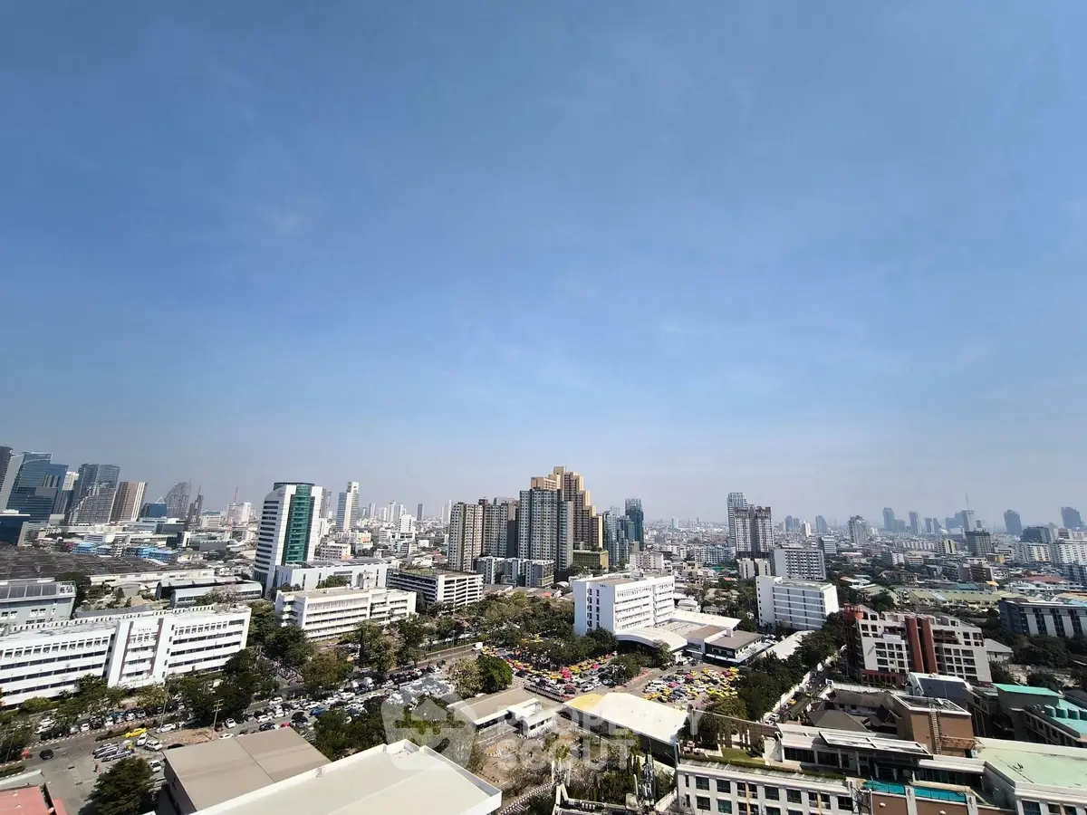 Stunning cityscape view from high-rise building showcasing urban skyline and architecture.